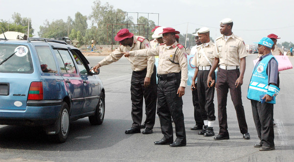 PIC. 12.  FRSC ZONAL COMMANDER,  ASSISTANT CORPS MARSHAL, CHARLES THEOPHILUS (L), WITH SECTOR  COMMANDER, CORPS COMMANDER OLUMIDE OLAGUNJU, AT THE COMMENCEMENT FRSC "OPERATION SHIELD" ON   KADUNA - ABUJA HIGH WAY IN KADUNA ON MONDAY (6/5/13) .